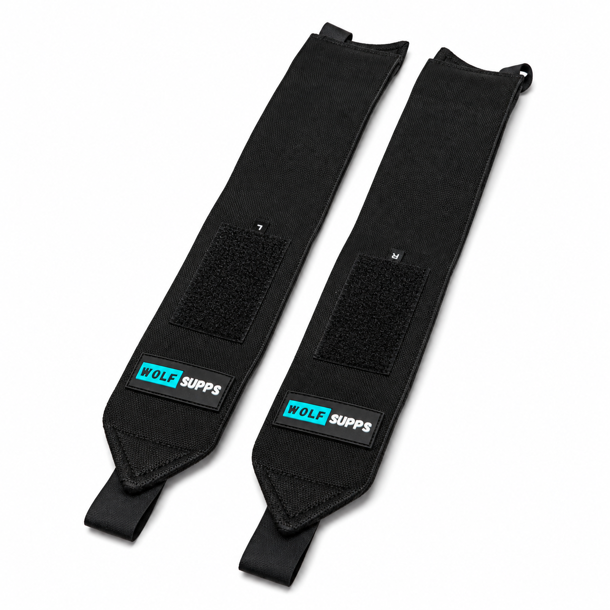 Two black Wolf Supps wrist supports shown on a plain white background, one for left and right wrists, both featuring a hook-and-loop closure and a brand label.